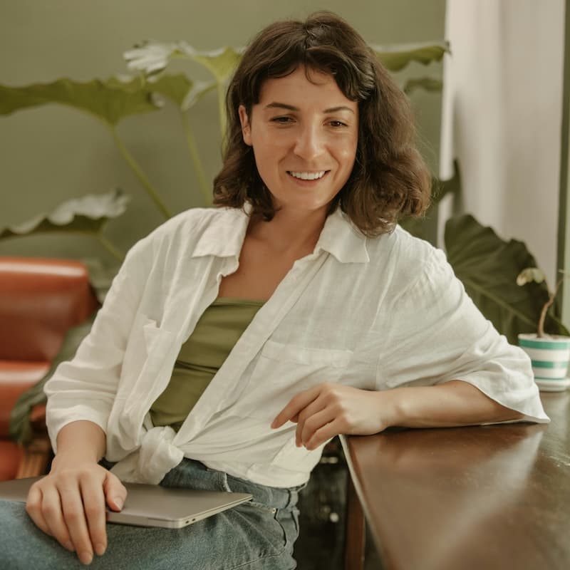 Therapist seated while discussing career growth at Uponza.